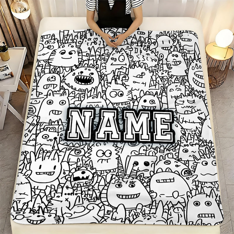 Personalized cozy coloring blanket displayed on bed showing large size