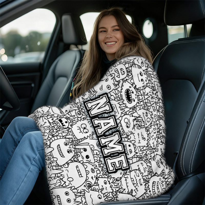 Woman using personalized cozy coloring blanket in car
